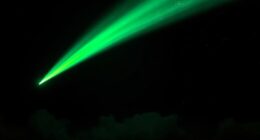 green comet lights sky