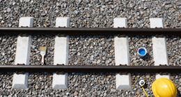 Painting The Sides Of Railroad Rails White To Reduce Derailment